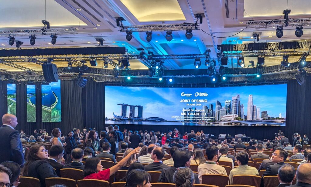 Panoramic screen with an image of the skyline of Singapore welcomes attendees to Singapore International Water Week.