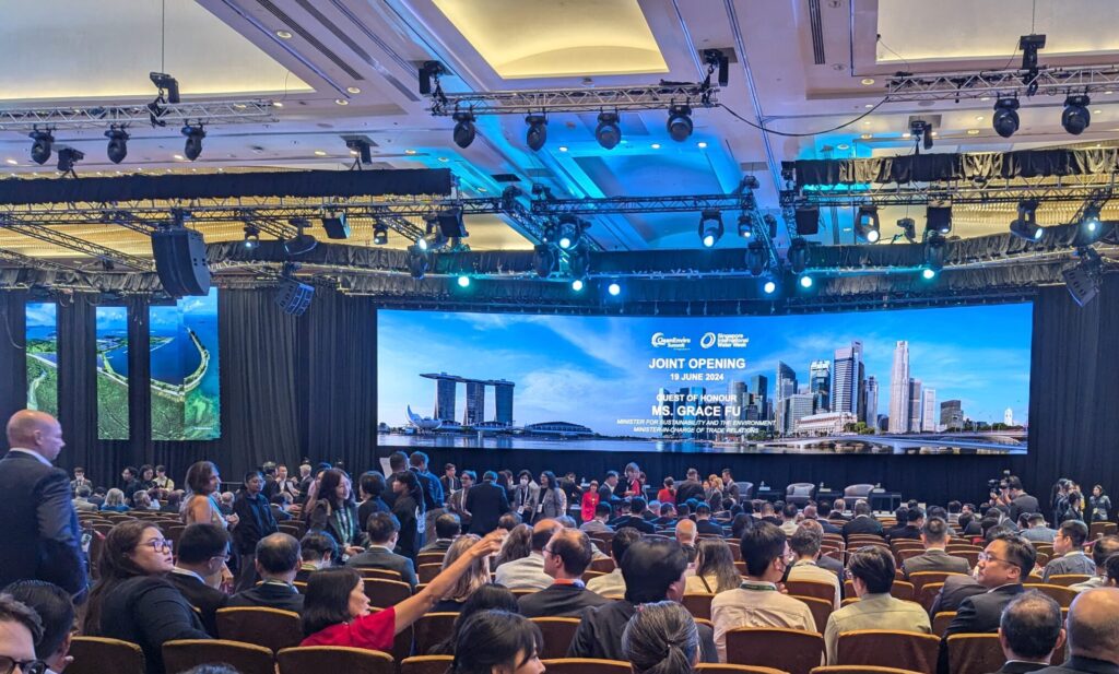 Panoramic screen with an image of the skyline of Singapore welcomes attendees to Singapore International Water Week.